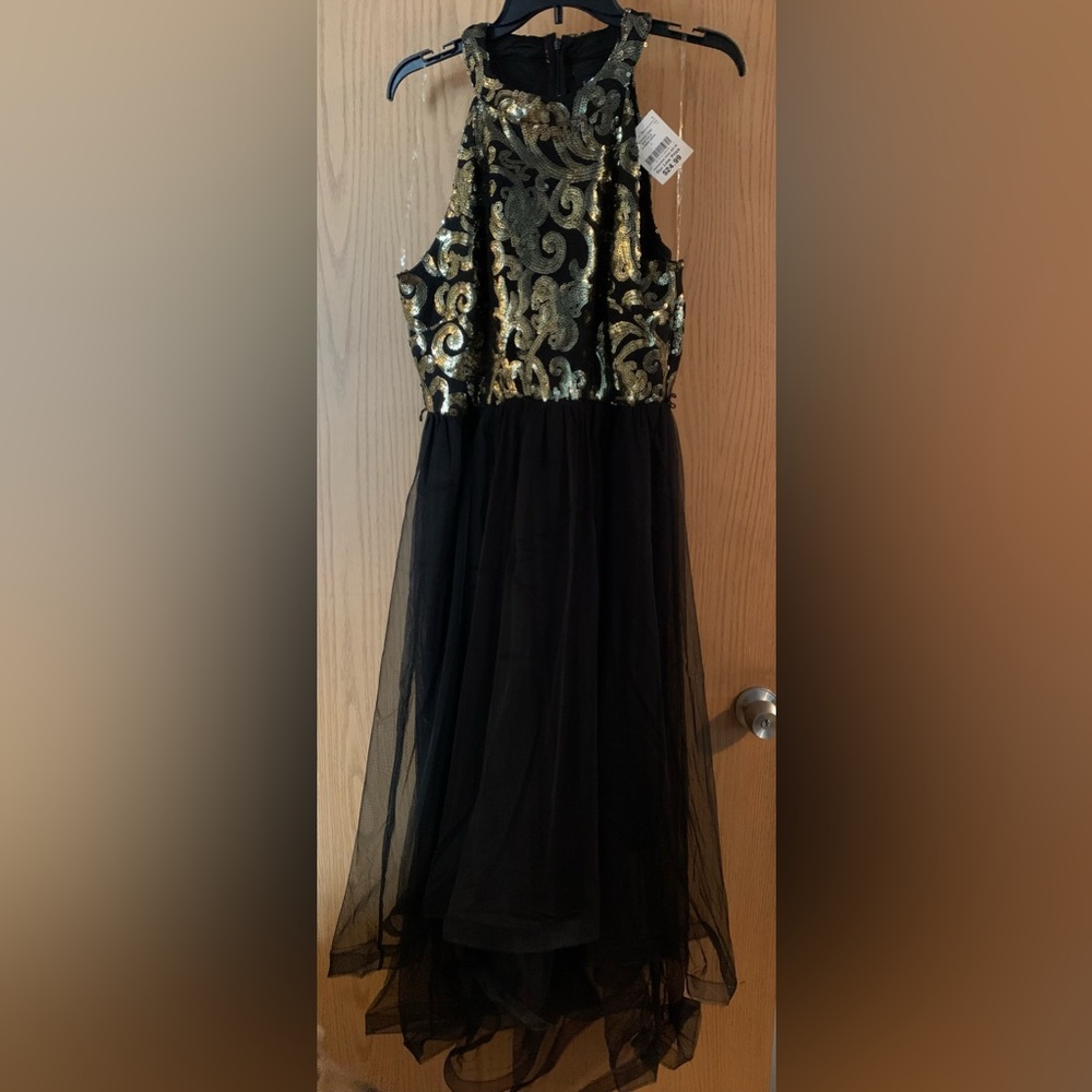 Black tool dress with gold sequins